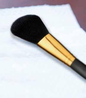 damp. Once sprayed, gently sweep brush over paper towel until all makeup