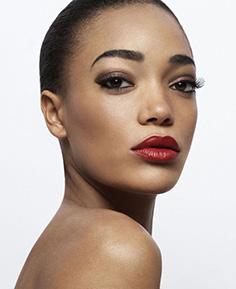 First, fill in lips with a lip liner that matches your lipstick shade, and then apply lipstick and/or a touch of gloss.