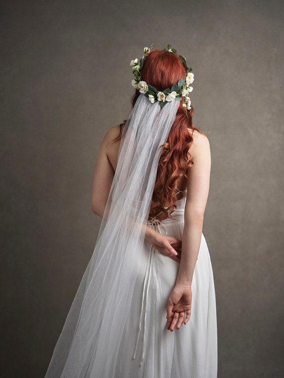 The veil above I am in love with! The flower crown and little yellow roses is simple but full of personality.