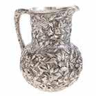 SILVER 446 Rare Kirk repousse coin silver water pitcher late 19th century, globular form with repousse bird, floral and foliate decoration, 9 in H, no monograms, 3125 ozt Est $2,000-4,000 Provenance: