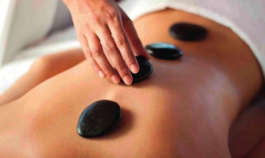 MASSAGE & HOLISTIC THERAPIES Hot Stone Massage 62.00 This revolutionary way to treat aches and pains through the use of hot and cold stones is a totally different experience.
