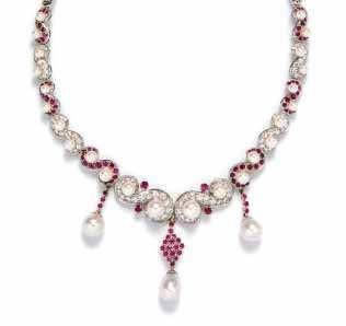 13 mm in diameter, the center suspending three pendants containing numerous round mixed cut rubies and three drop pearls measuring approximately 9.30-9.