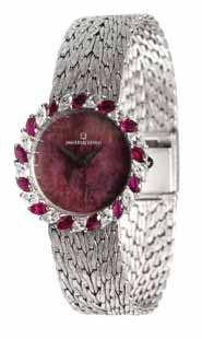 273 An 18 Karat White Gold, Diamond and Ruby Wristwatch, Universal Geneve, the bezel containing 13 marquise cut diamonds weighing approximately 1.