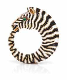pendant containing stripes of black and white enamel with two round cabochon cut emerald