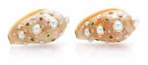 339 337 338 337 A Pair of 18 Karat Yellow Gold, Sapphire, Cultured Pearl and Shell Earclips, Trianon, composed of mottled cream and tan color shells accented with numerous gold bezels containing 12