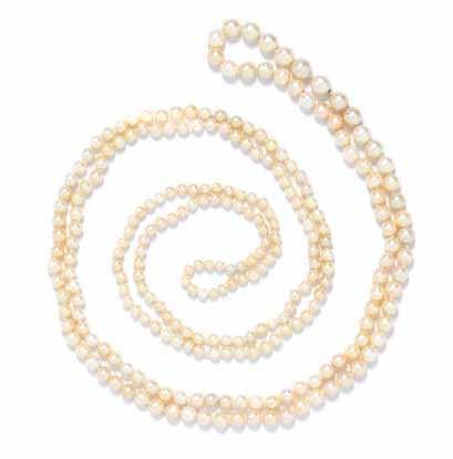 401 401 A Graduated Natural Pearl Strand Necklace, consisting of 257 round, near round and semibaroque natural pearls measuring approximately 3.86-8.