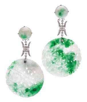 402 A Pair of 18 Karat White Gold, Jade and Diamond Earrings, retailed by Fred Leighton, containing two round plaques of carved and pierced mottled green and white jadeite jade in a loral motif, two