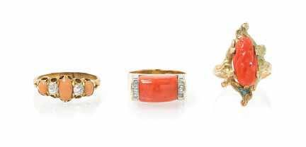 $200-300 984 A Collection of Yellow Gold and Gemstone Rings, consisting of a ring containing one rectangular cut corner brilliant cut synthetic pink sapphire measuring approximately 23.02 x 16.71 x 7.