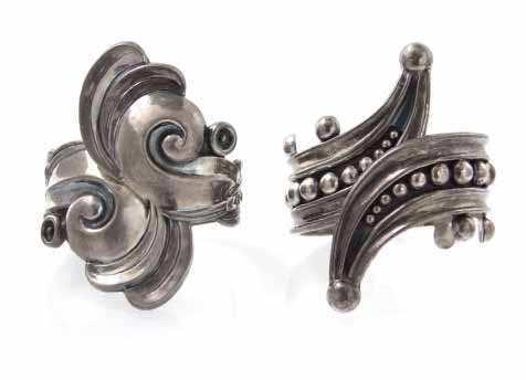 1149 1150 1149* A Sterling Silver Bracelet, Mexico, consisting of six curvilinear links with box clasp. Stamp: 925 STERLING MEXICO. 40.10 dwts. Property from the Estate of Elsie V.