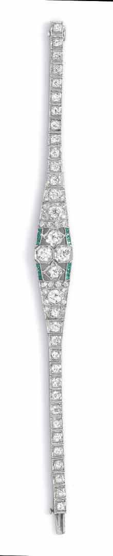 85 carats total, 20 round single cut diamonds weighing approximately 0.40 carat total, and 16 French cut simulated emeralds. 12.20 dwts.