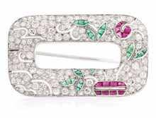 167 167 An Fine Art Deco Platinum, Diamond and Carved Ruby Bracelet, in an intricate openwork link design with a pave set rectangular clasp, containing 26 claw-prong set carved ruby leaf motif