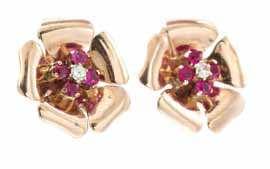 210 A Pair of Retro Rose Gold, Platinum, Ruby and Diamond Dressclips, consisting of two stylized ribbon motif gold clips in a mirrored layout accented with platinum overlays containing four old