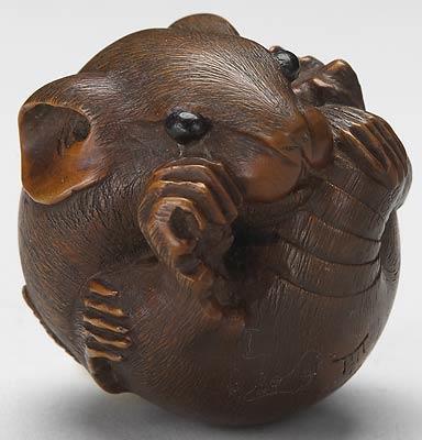 Netsuke of Curled Rat By Masano of Ise 17 th century Wood, H: 1.
