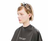 inches above the top of the ear. Secure with a TIGI PRO sectioning clip. 04. Put on protective gloves.