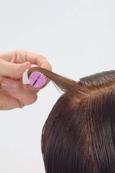 OFF-BASE PLACEMENT Hair is wrapped at an angle 45 degrees below perpendicular to its base section.