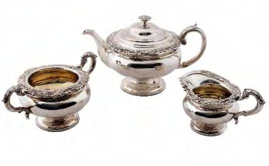 174 174 A matched George IV/William IV Scottish three-piece tea service of compressed circular form with cast shell, scroll and foliate overhanging rim, having leaf capped scroll