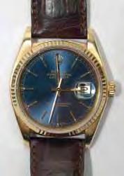 450-500 221 Rolex Oyster A gold gentleman's wristwatch, the blue dial having baton numerals and hands, date aperture and signed 'Rolex, Oyster perpetual, Datejust, Superlative Chronometer, Officially