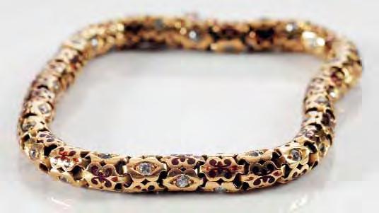 257 257 A late 19th century enamelled gold and diamond mounted bracelet of tubular