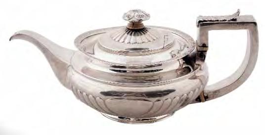 80-120 145 A matched spinster s threepiece tea service of oval outline with half fluted decoration, maker Victor Luxemburg, Birmingham, 1909/10, 335gm,