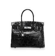 Handbags and Accessories Important Watches Important Watches Hermès 2016, A Rare Matte White Himalayan Niloticus Crocodile Retourne Kelly 25 With Palladium