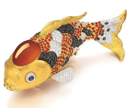 73-Carat Spessartite Garnet, Orange Sapphire and Diamond Clown Fish Brooch Estimate: HK$ 85,000-120,000/US$ 10,900-15,400 This clown fish with a distinctive appearance has a body fashioned from