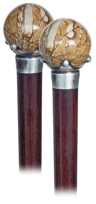 Remarkable for its large size and agreeable plain surface, this cane has a timeless allure and is still great to use or to add to a displayed collection. H. 3 x 3, O.L. 36 $200-$300 94. 95. 96.