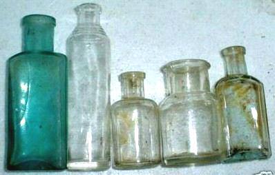 PATENT MEDICINE, PERFUMERY, HAIR OIL & SMALL BOTTLES Numerous small bottles have been found in the hillside dumps.