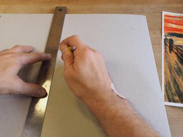 make an impression -- you'll use this mark as a guide for cutting out a hole to allow the horn to fit.