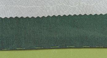 Temporarily bind raw edges When constructing a garment from fabric that ravels easily, fold organza