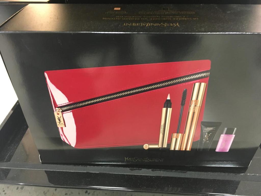 YSL 1. PU Make Up Pouch. 2. Pouch free with YSL Touche Eclat, Mascara, Moisture Glow and Make up Remover. Set cost 50. 3.