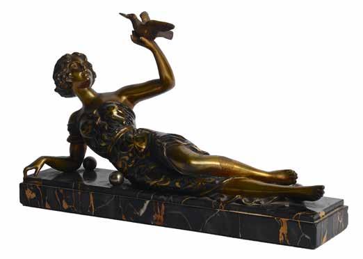 Lot 287A Art Deco Patinated and gilded bronze figure of a reclining lady holding