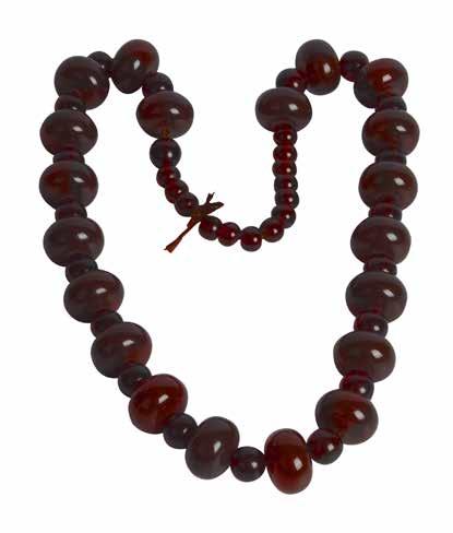 500 R2 500 Lot 506 Brown amber neckalace of