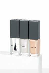 THREE Nail Polish Basecoat 1,800 yen (excluding tax) Just like a makeup base, this basecoat smooths out any irregularities of contour or pigment, helping polish cling to your nails while creating a