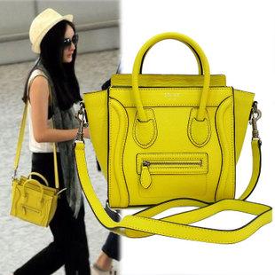 The first word refers to a facial expression a Chinese internet meme- that the bag resembles.