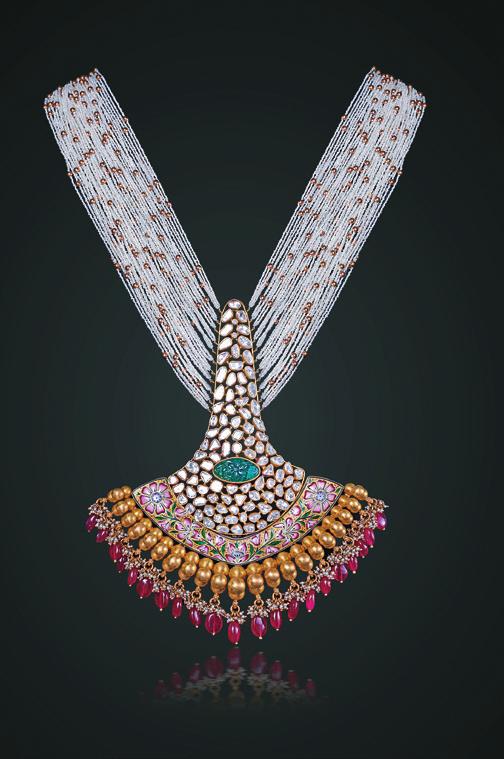 His bridal collection with long necklaces is arranged with pearl rows, uncut diamonds, Russian emeralds.