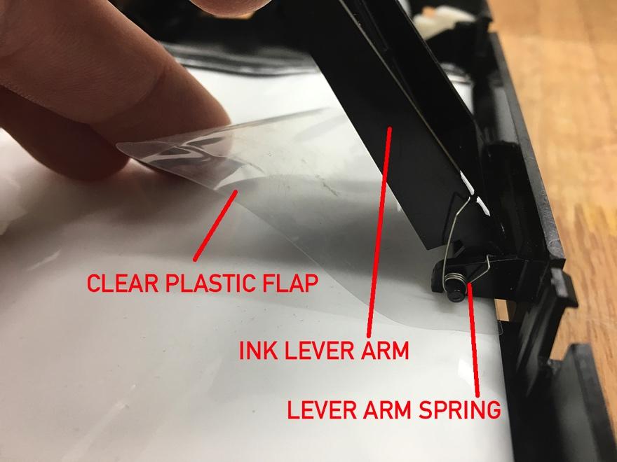 2.3. Once the OEM bag is removed, try to remove any remaining residual doublesided tape that remains in the cartridge.
