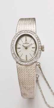 OMEGA GOLD / STEEL - LADIES #6864 #7518 #7810 LADIES OMEGA WATCH SOLID 18K GOLD WITH 1 CT TW DIAMOND BEZEL MANUAL WIND.