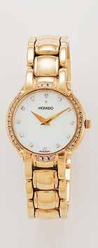 $6,238 2,495 LADIES' MOVADO DIAMOND WATCH WITH MOTHER-OF-PEARL DIAMOND DIAL 14K 6 INCH WRIST SIZE.