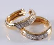 268 269 273 268. A pair of 18ct yellow gold and diamond mounted hoop earrings. 200-250 269.