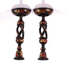 125 Pair of Kashmir candlesticks Indian black lacquered, twist stems decorated