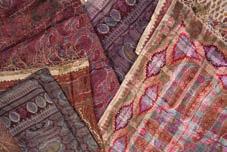 177 Group of silk shawls Indian variously decorated with paisley and other designs