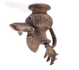 194 Sukunda oil lamp 19th century, Nepalese copper, the top part of the handle modelled as a five headed cobra, the