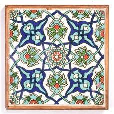 1 Iznik style tile Turkish,19th Century/20th Century decorated with scrolling flower heads, all painted in blue, green and read against a white