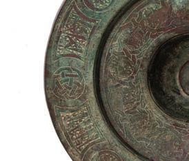 5cm wide 300-500 (plus 24%BP*) 282 Safavid dish Iran 16th/17th Century the border engraved with separate panels of calligraphy, near the