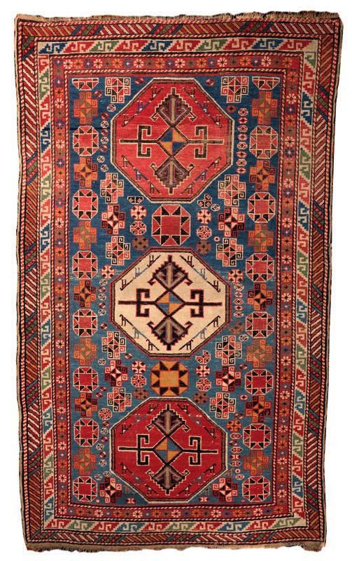 335 Shirvan rug Caucasian of pale blue ground, three
