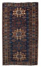 348 Caucasian rug of blue ground with three medallions and triple foliate