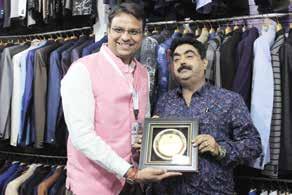 A well known name for ethnic wear- Chirag Memento presented by Gagan Marwah to Rajeev Chawla, Owner, Gaurav Garments (Chirag).