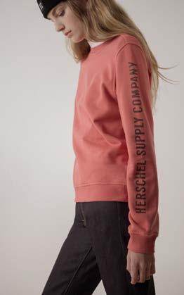 40032 Built with premium French Terry, the Women's Crewneck sweatshirt is a modern rendition of a timeless style.