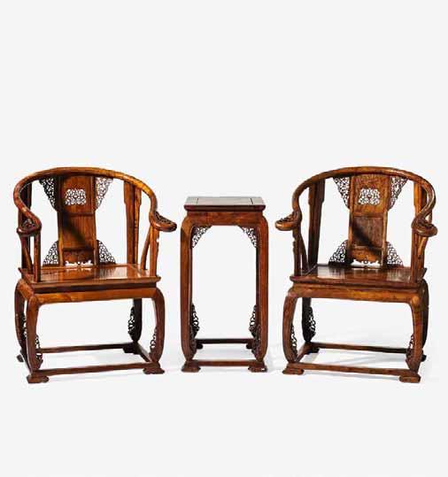 184 244 A set of two Chinese huanghuali horseshoe-back armchairs with matching huanghuali table 20th century H. 77.5 cm H.