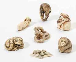 000 292 A collection of seven Japanese ivory netsuke Meiji period (1868-1912) and later Comprising a horse; a playful monkey; a tiger; a mouse on a fan; two horses circling around one